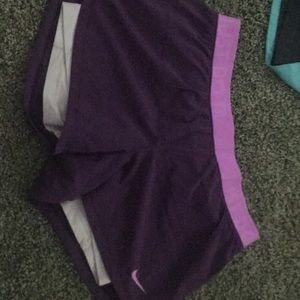 Purple Nike shorts